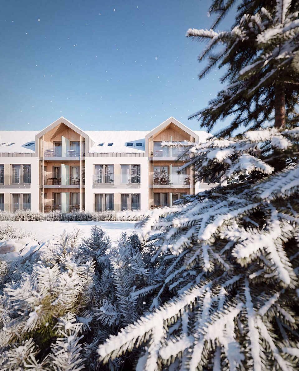 SOHO VUE zimą, ośnieżone dachy i świerki na pierwszym planie